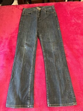 Cowgirl Tuff Dark Blue Flare Jeans small hole in the knee